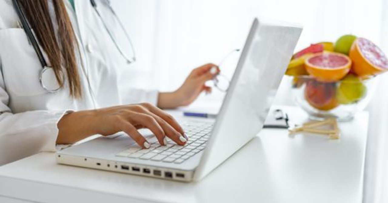 A person typing on a keyboard