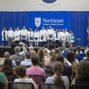 Faculty members stand to be recognized