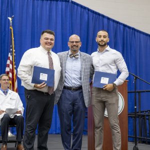 Dr. Mestan with two student award winners