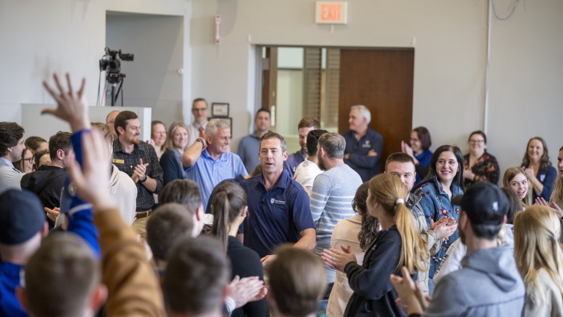 Dr. Kollmann moving through the crowd