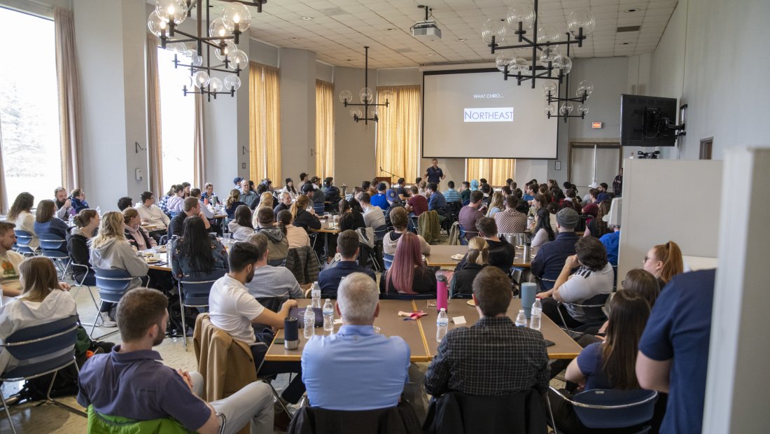image of the crowd watching Dr. Kollmann
