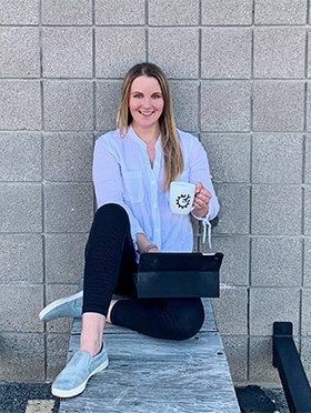 Dr. Brittany Ellis typing on a computer