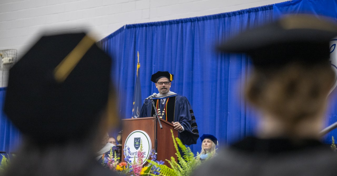 Dr. Michael Mestan addressing Northeast graduates at commencement