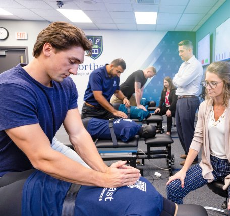 Student making an adjustment in the FAST lab