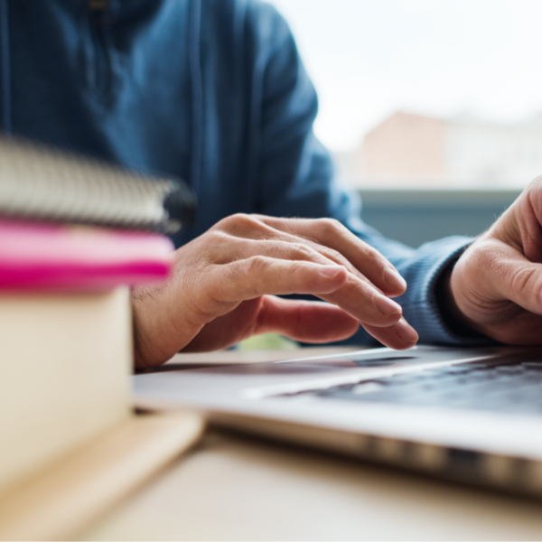 A student studying with a computer