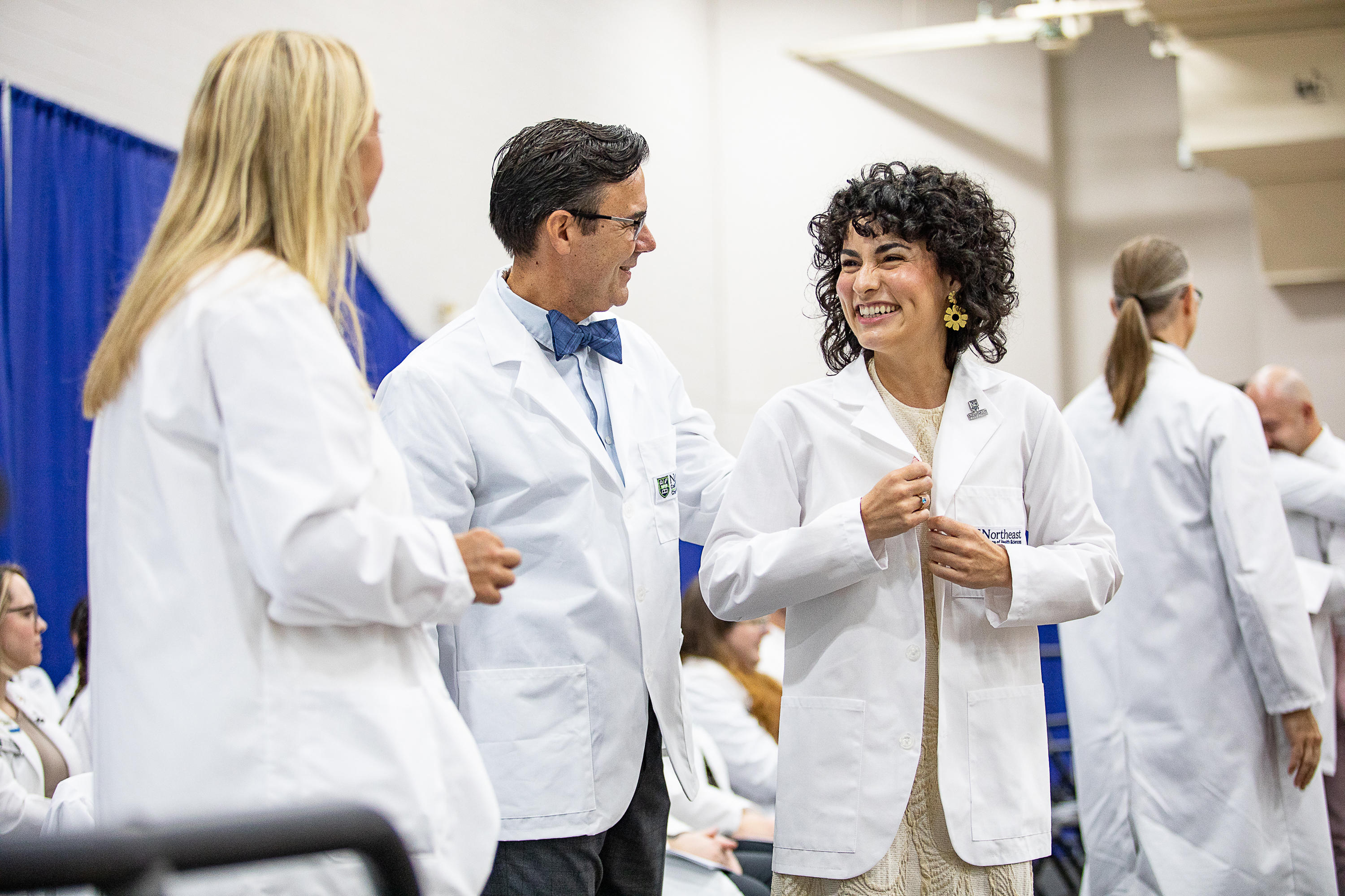 Dr. Spiker speaking with faculty