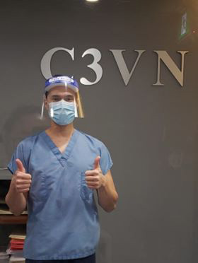 Dr. Viet Nguyen with a protective mask